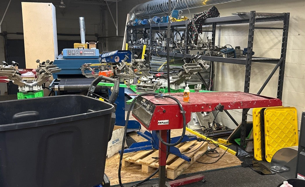 Screen printing presses at the Jons Spot shop in Toronto