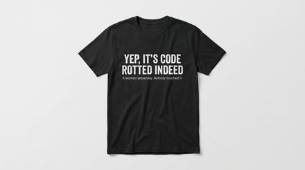 Code Rotted meme tee — black tee with YEP, IT'S CODE ROTTED INDEED in white text